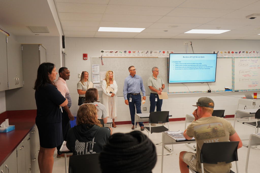 People standing in classroom