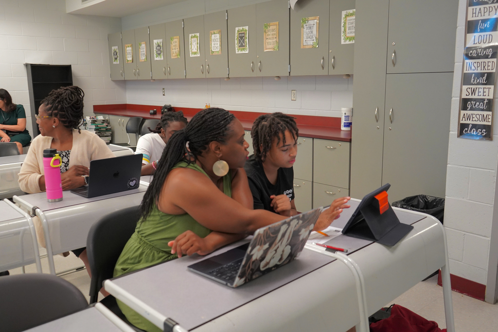 Teacher and Student working on iPad