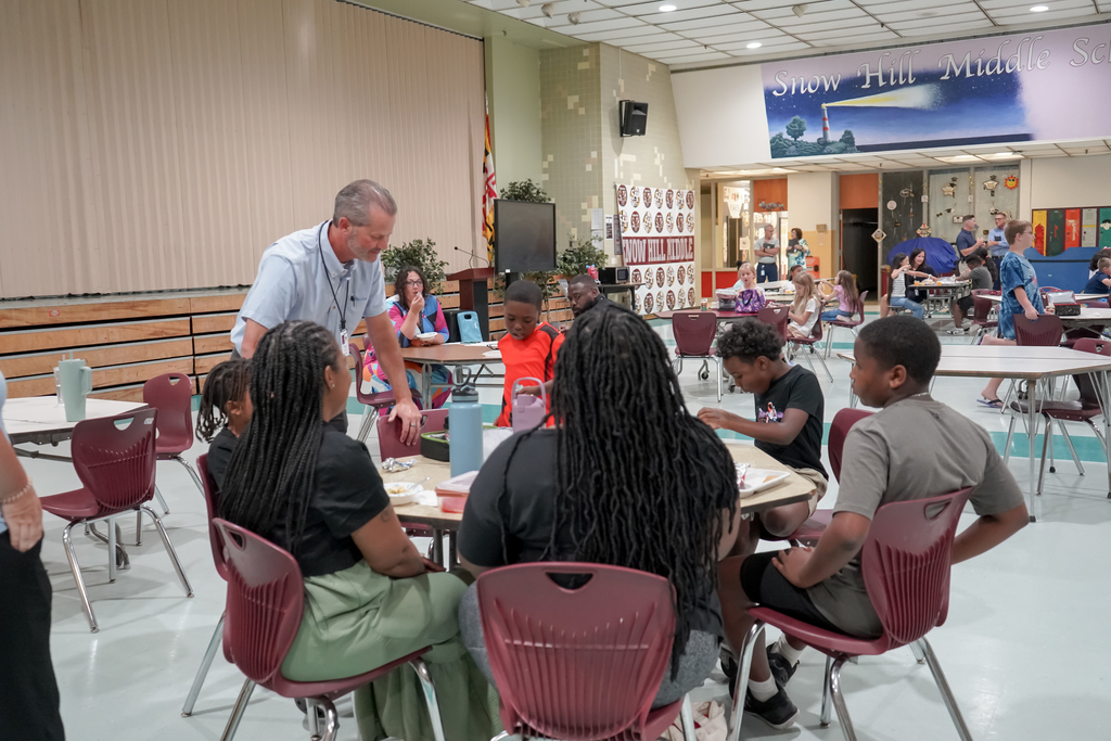 Students and staff in cafeteria