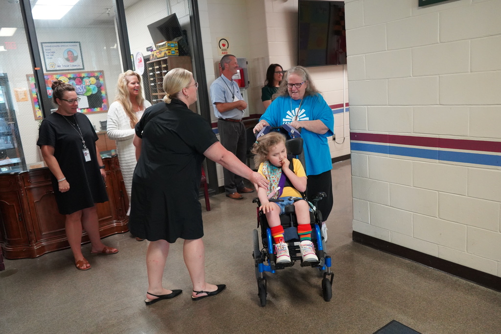 Student in wheelchair in hallway