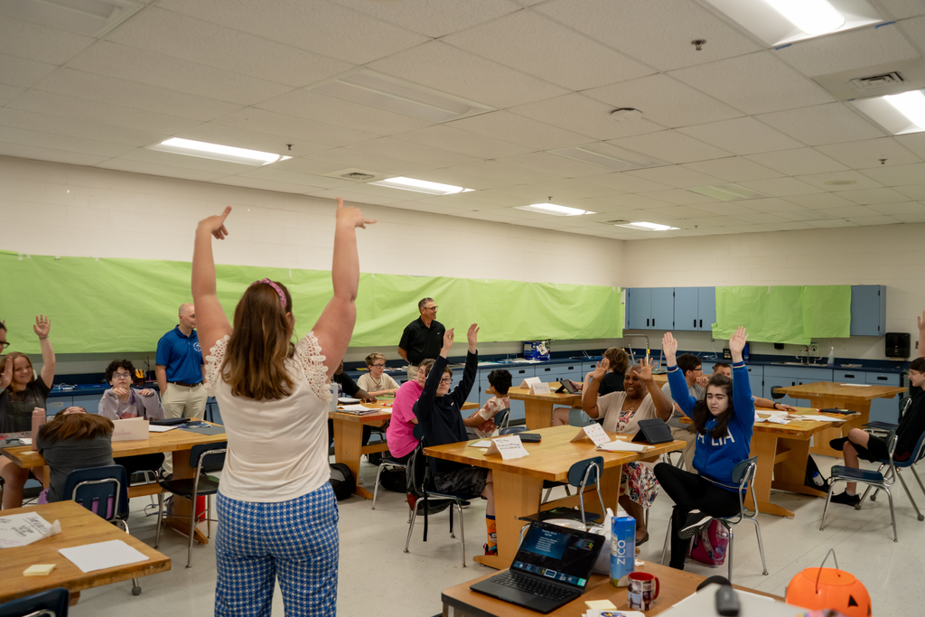Teacher teaching students