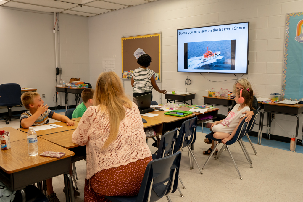 Students and adults in a classroom