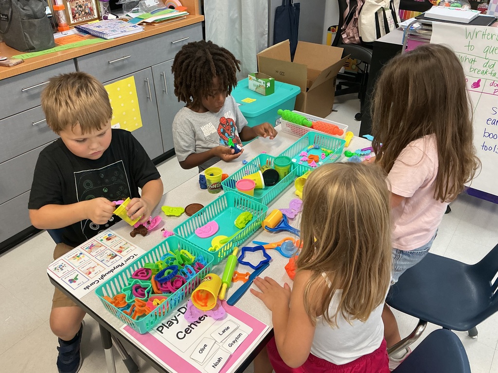Kids playing with play dough