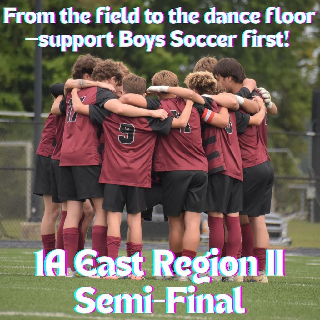 Boys soccer in a huddle before a game.