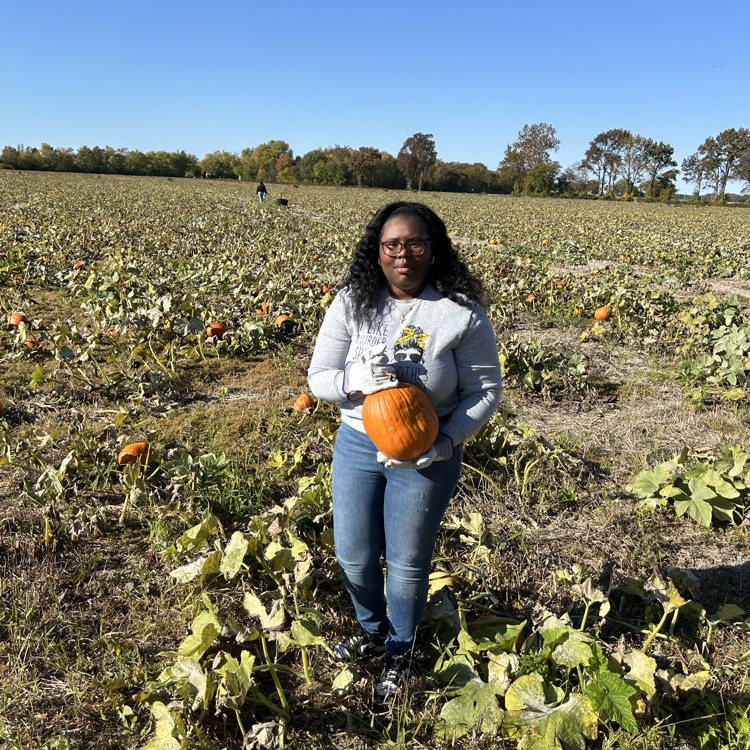 students carrying pumpkins 4
