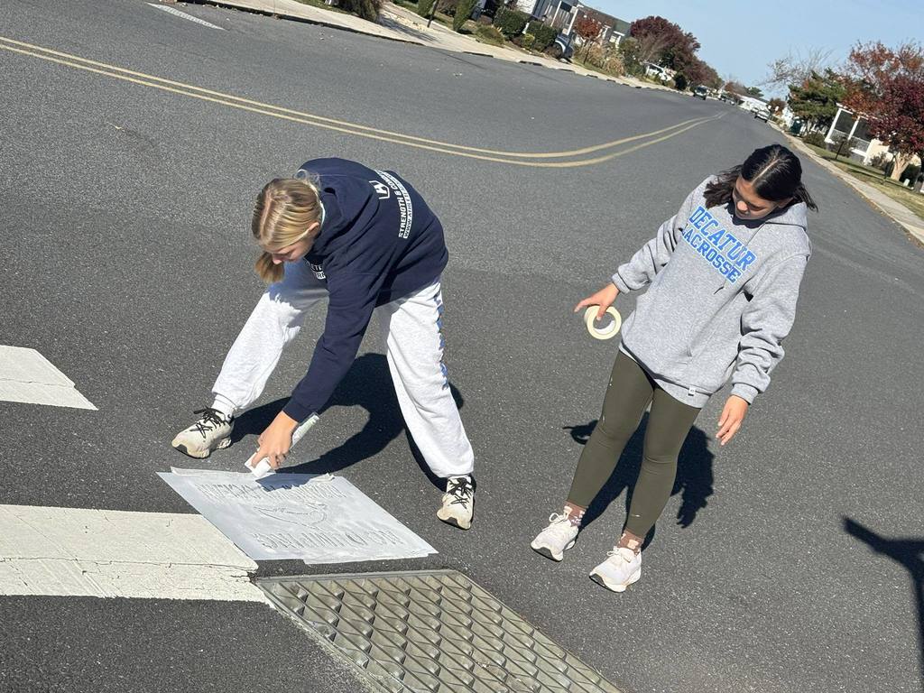 Surfriders marking storm drains 2025