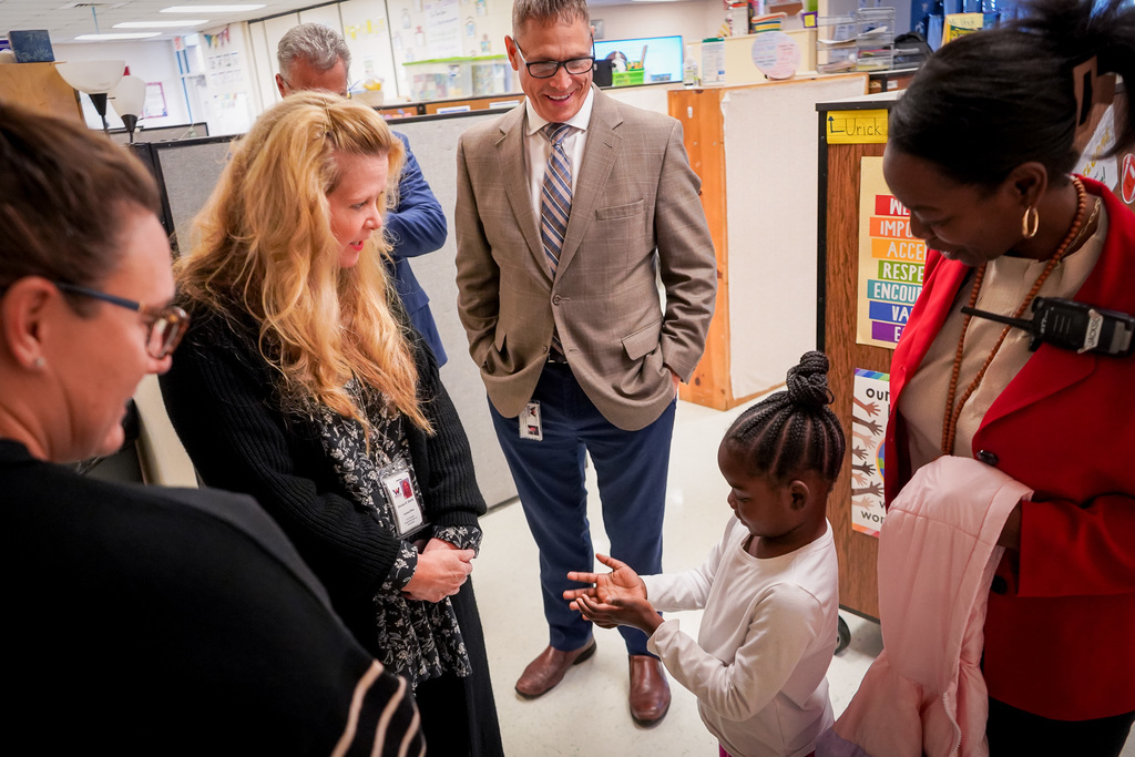 Young student talking with leadership