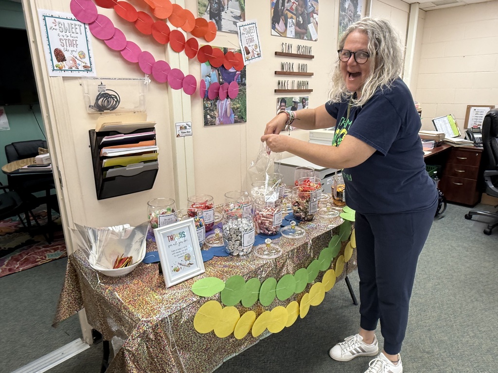 Staff member at candy table