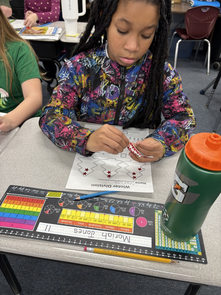 Third graders practice division