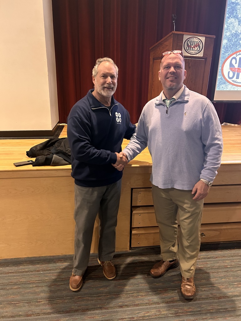 Mr ROsenfeld and Dr. Kehl Shaking Hands