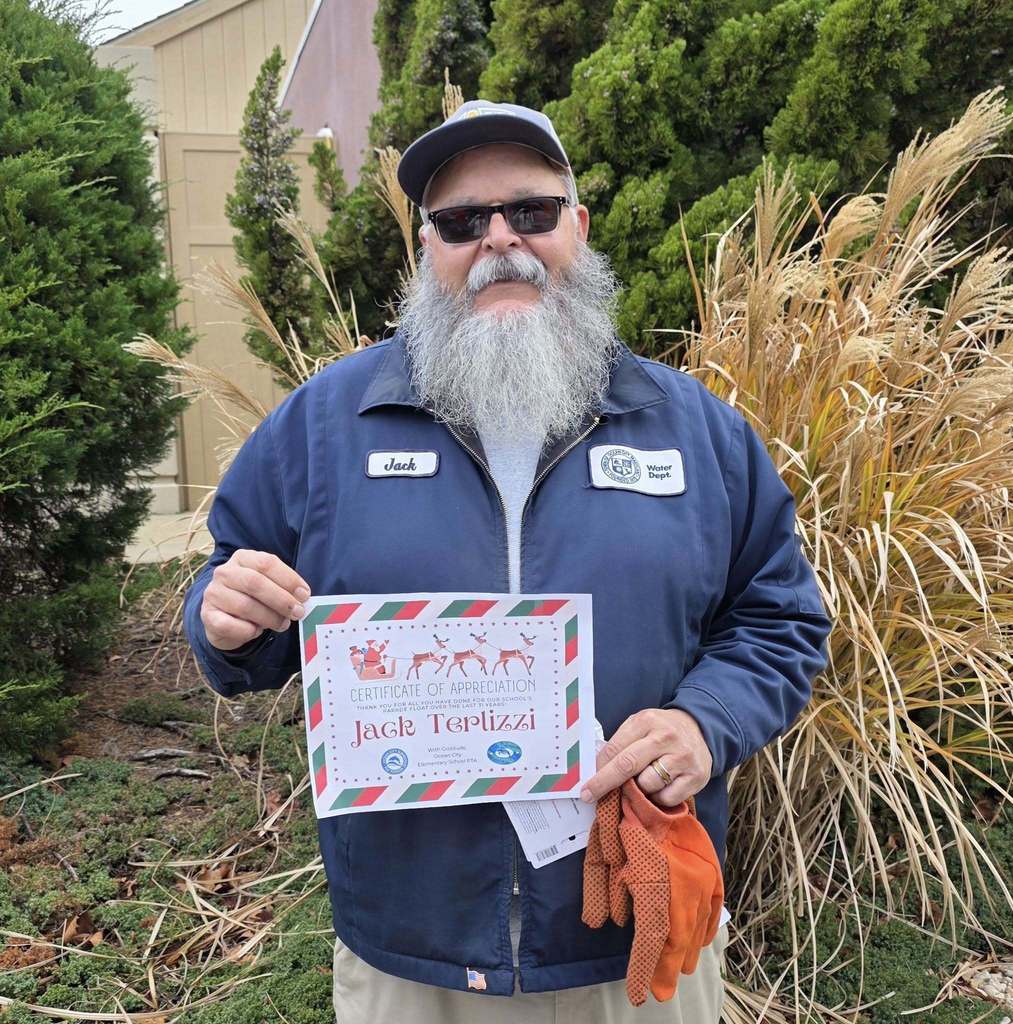 Mr. Terlizzi with certificate of appreciation