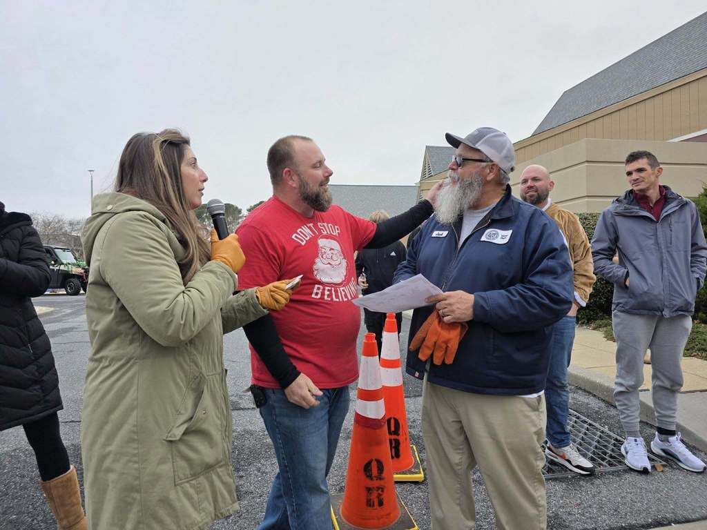 Mr. Terlizzi being congratulated