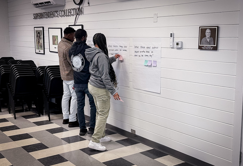 Ed Support Professionals Participate in Poster Walk Activity