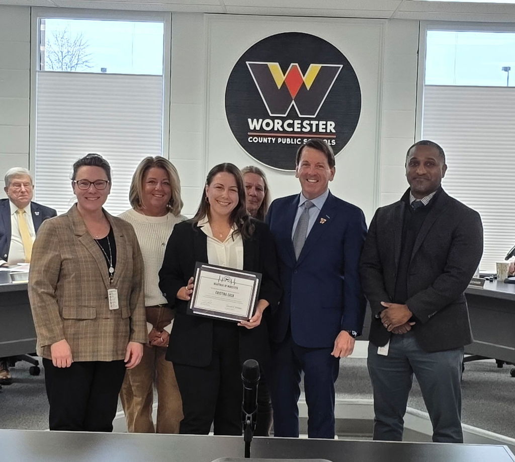 Mrs. Cash is awarded the Heartbeat of Worcester award and is presented the award with the board president and others