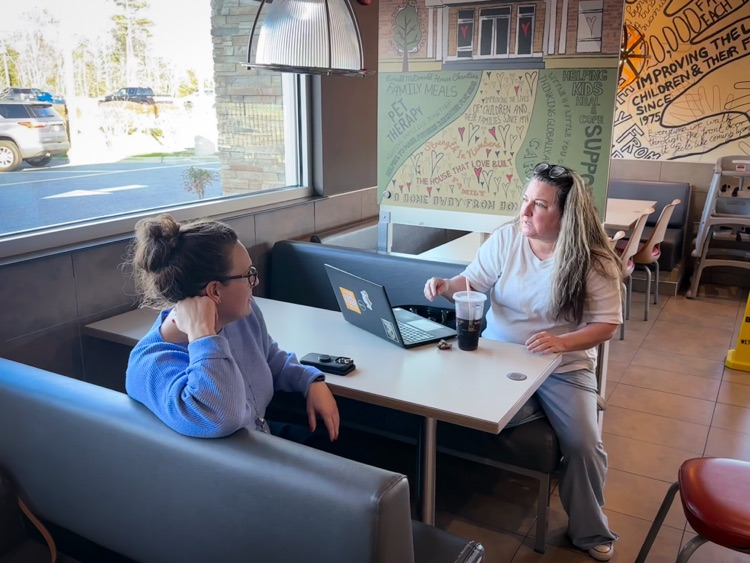 superintendent talks to parent