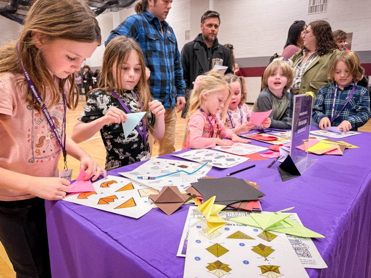 students at activity table