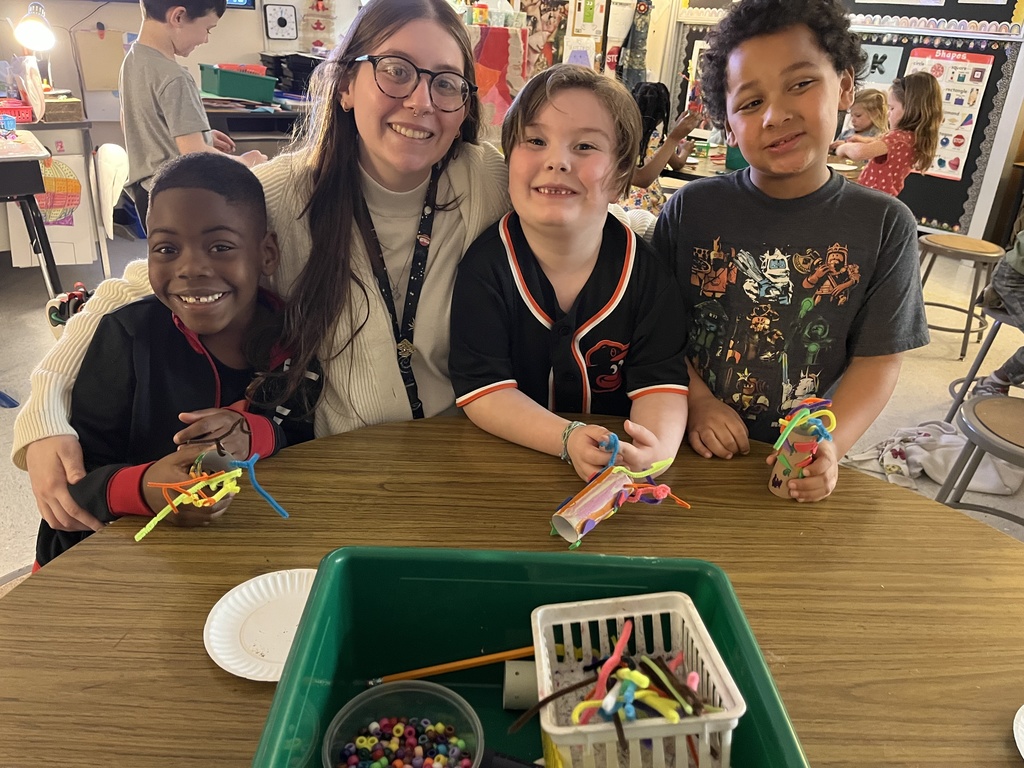 Student showing artwork