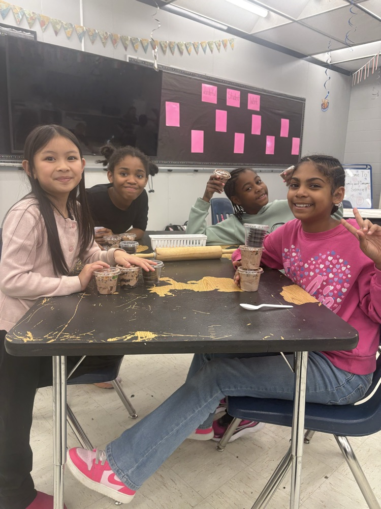 all smiles with finished dirt cups