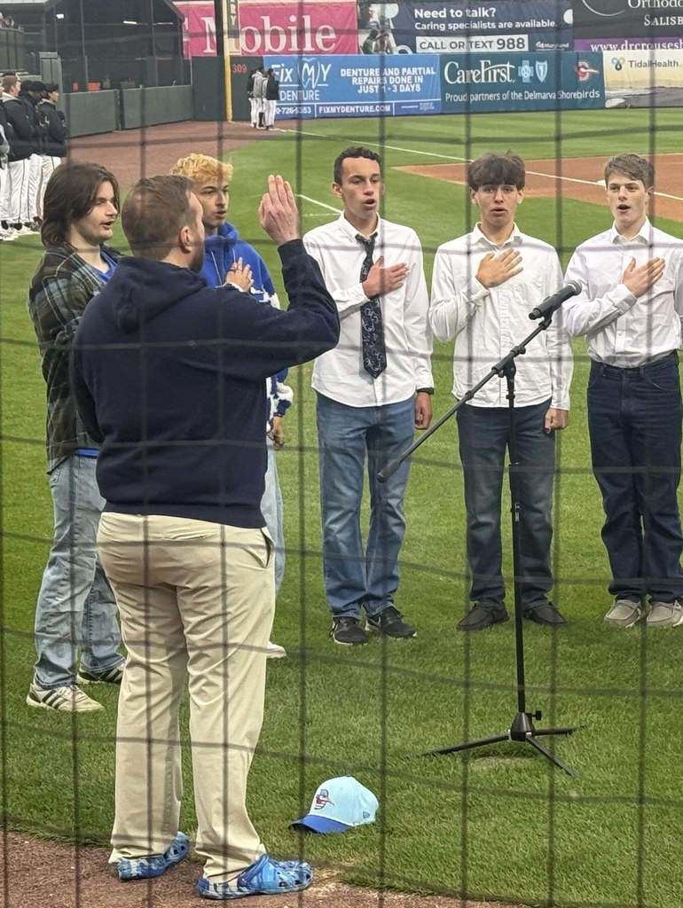 Choir sings National Anthem