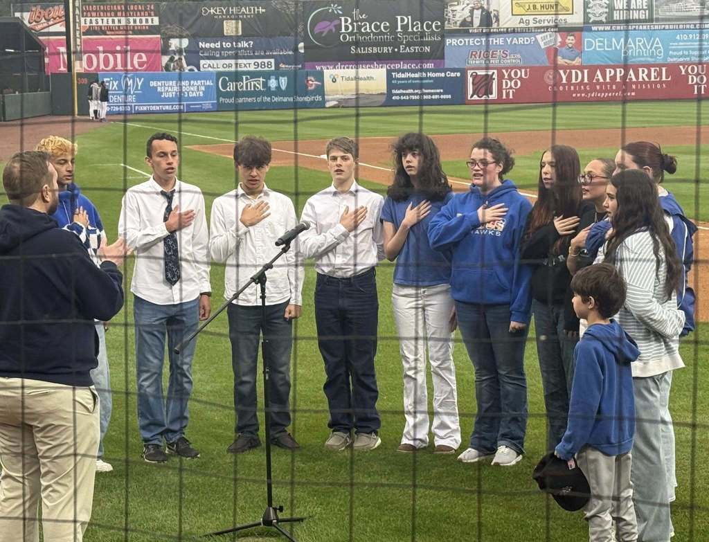 Choir sings National Anthem