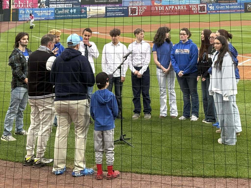 Choir sings National Anthem