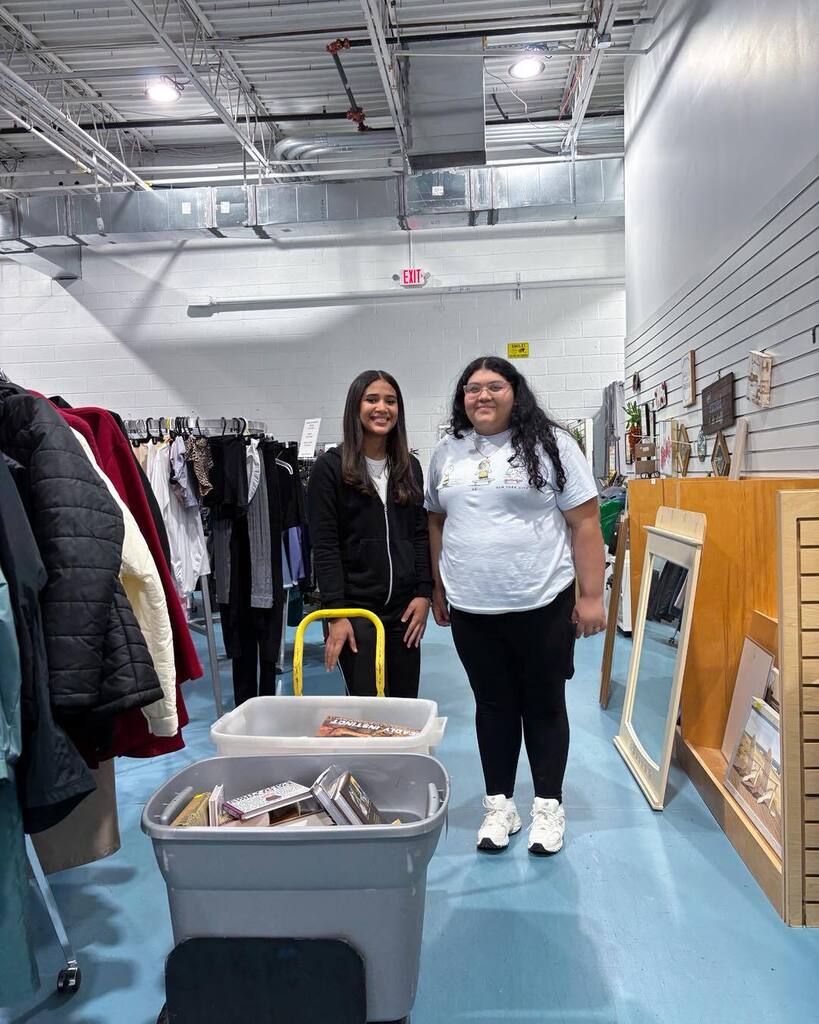 students volunteer at Coastal Hospice Thrift Shop