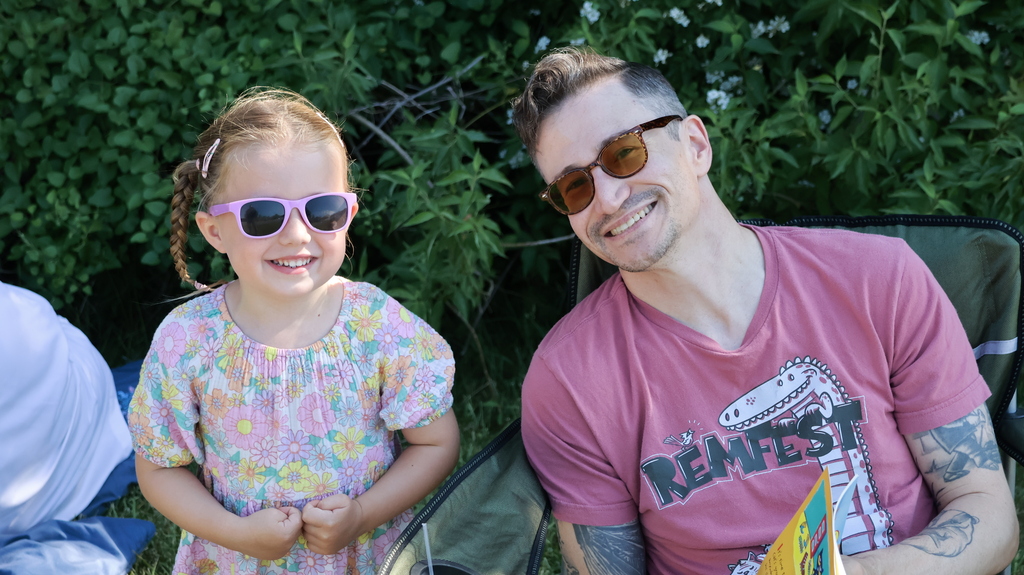 Parent and student outside with sunglasses