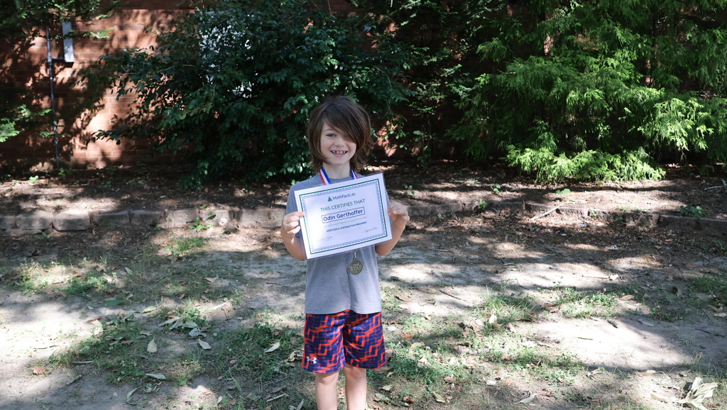 Student with Certificate