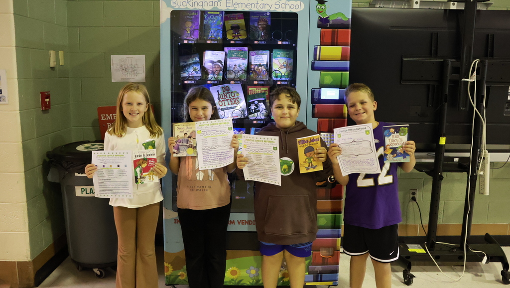 Group of students holding certificates