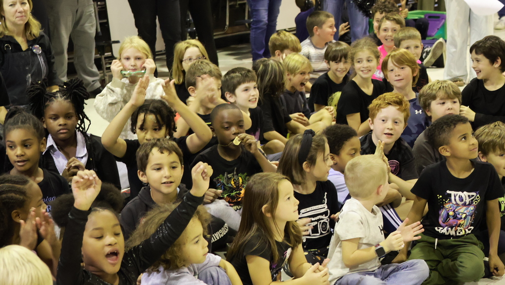 group photo of students cheering