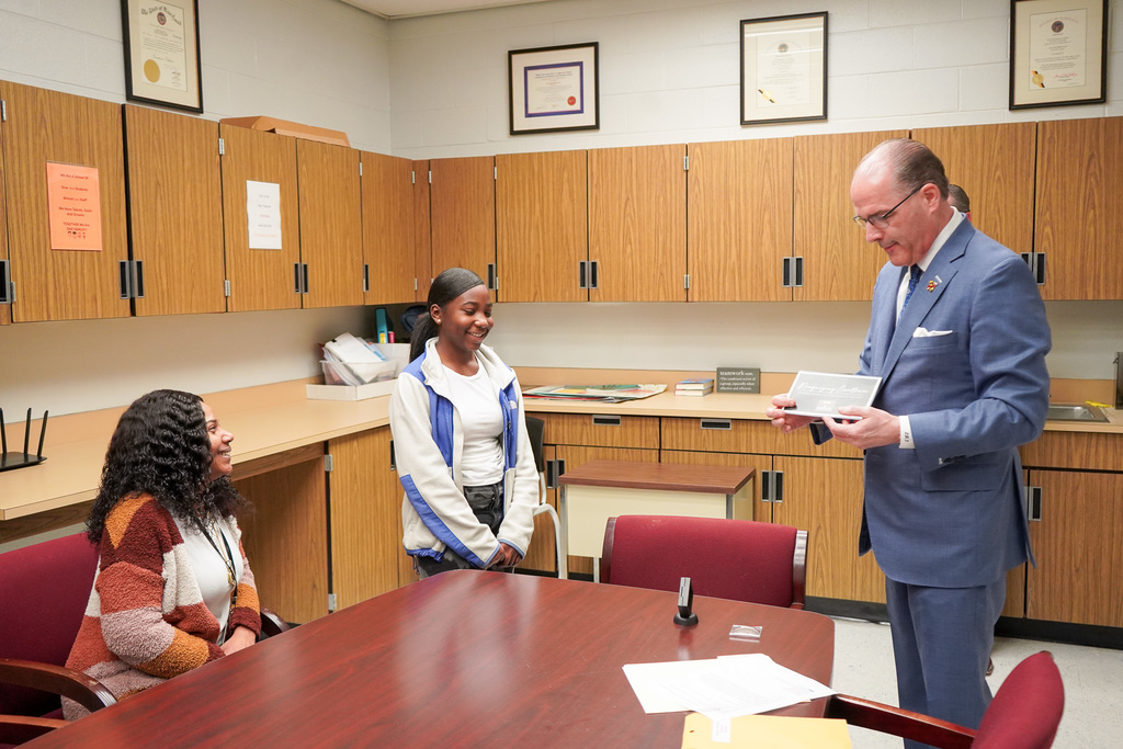 Superintendent Taylor speaks to Jayana about this award
