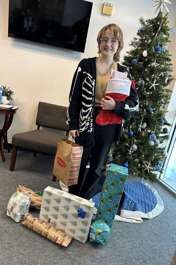 NHS student with gifts