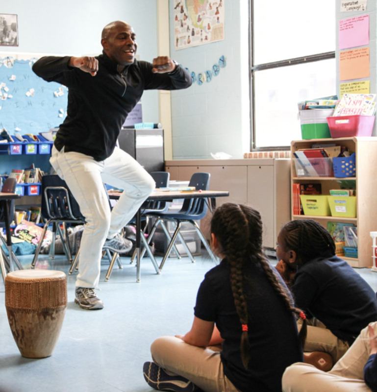 SSuuna performing in classroom