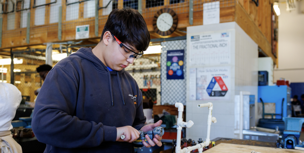 A student at a workbench