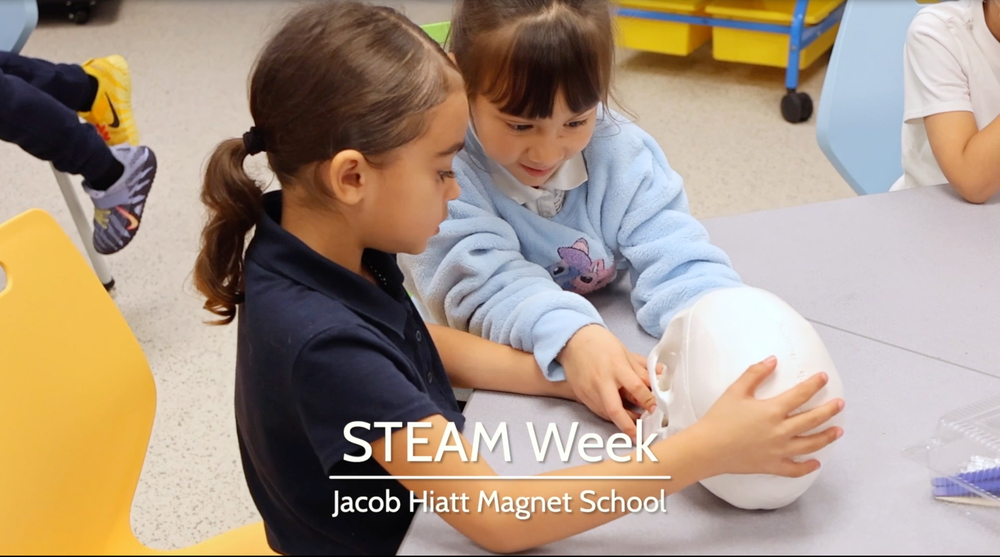 Two students engage in STEAM Week activities.