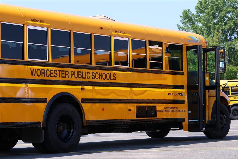 The side of a school bus with the words 'Worcester Public Schools' visible.
