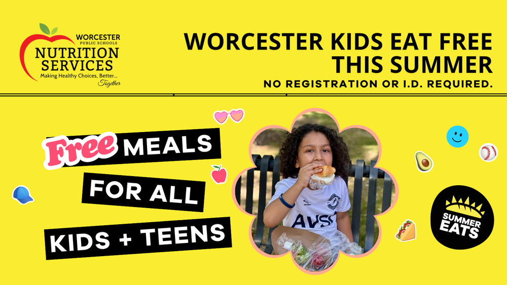 A child eats a sandwich as part of the "Summer Eats Returns to Worcester!" program.