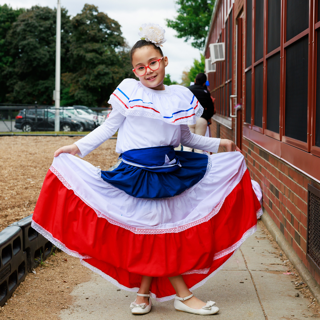 A student dressed in cultural attire.