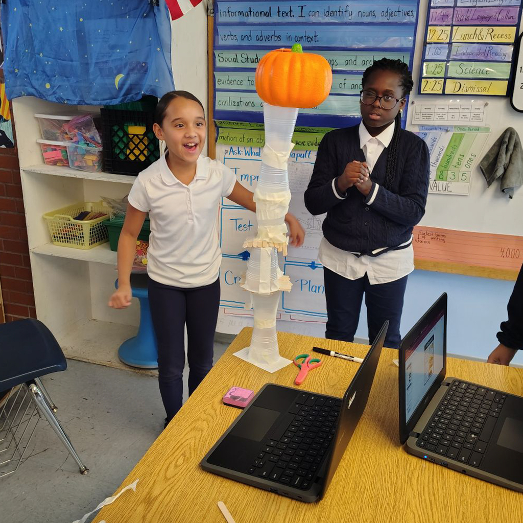Students work on pumpkin-related projects.