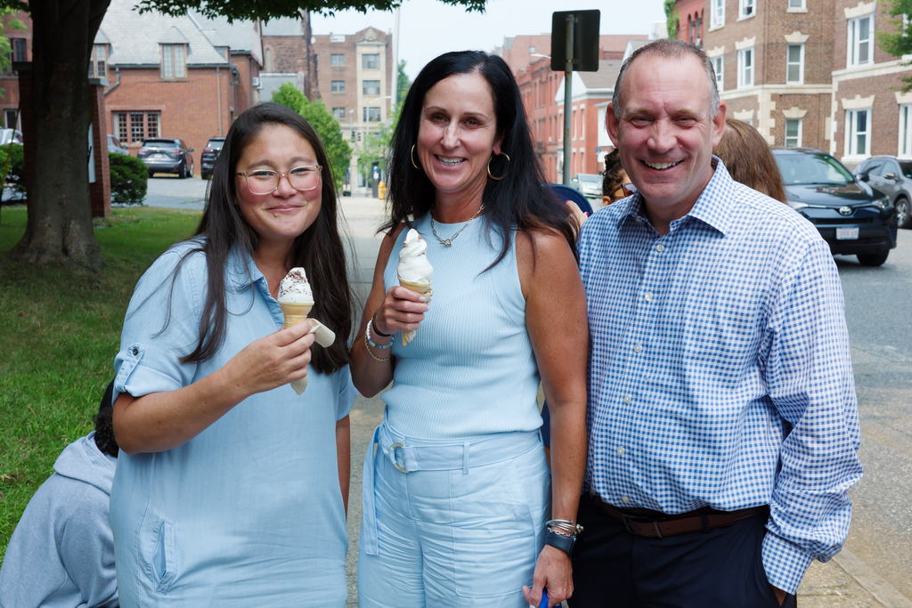 WPS staff smile with ice cream cones.