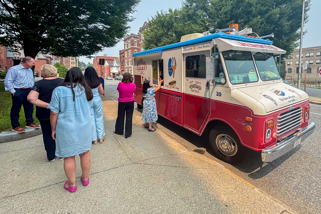 WPS staff get ice cream from an ice cream truck.