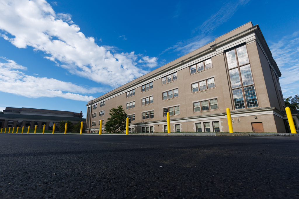 Roosevelt School with a blue sky above it.