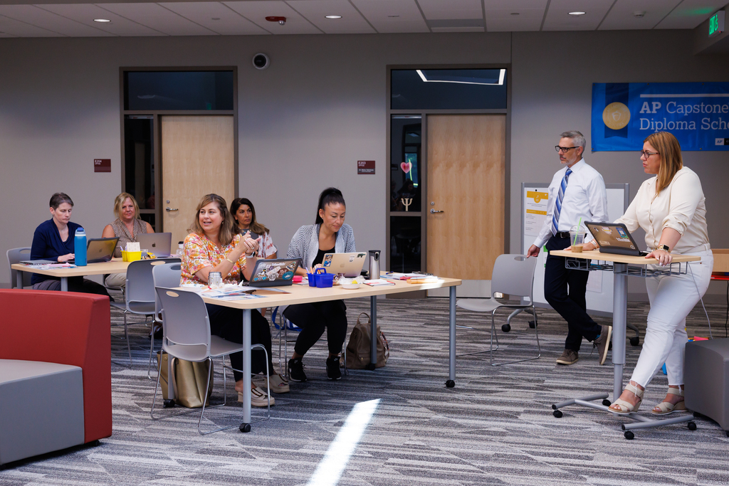 Principals and district administration collaborate during a Spark Leadership Academy meeting.