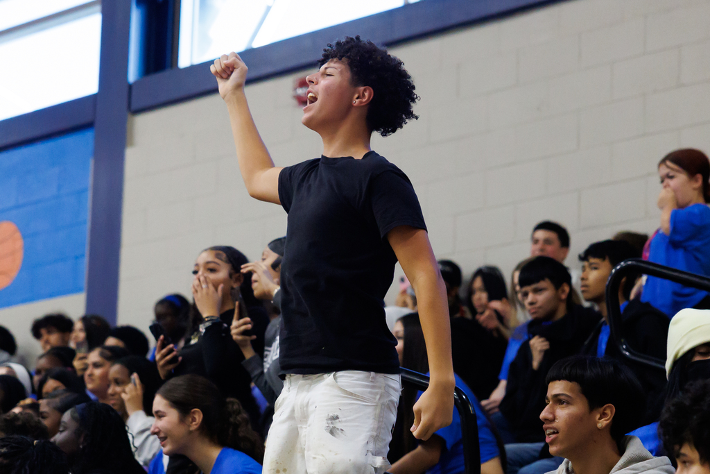 A student cheers during an event at Worcester Tech.