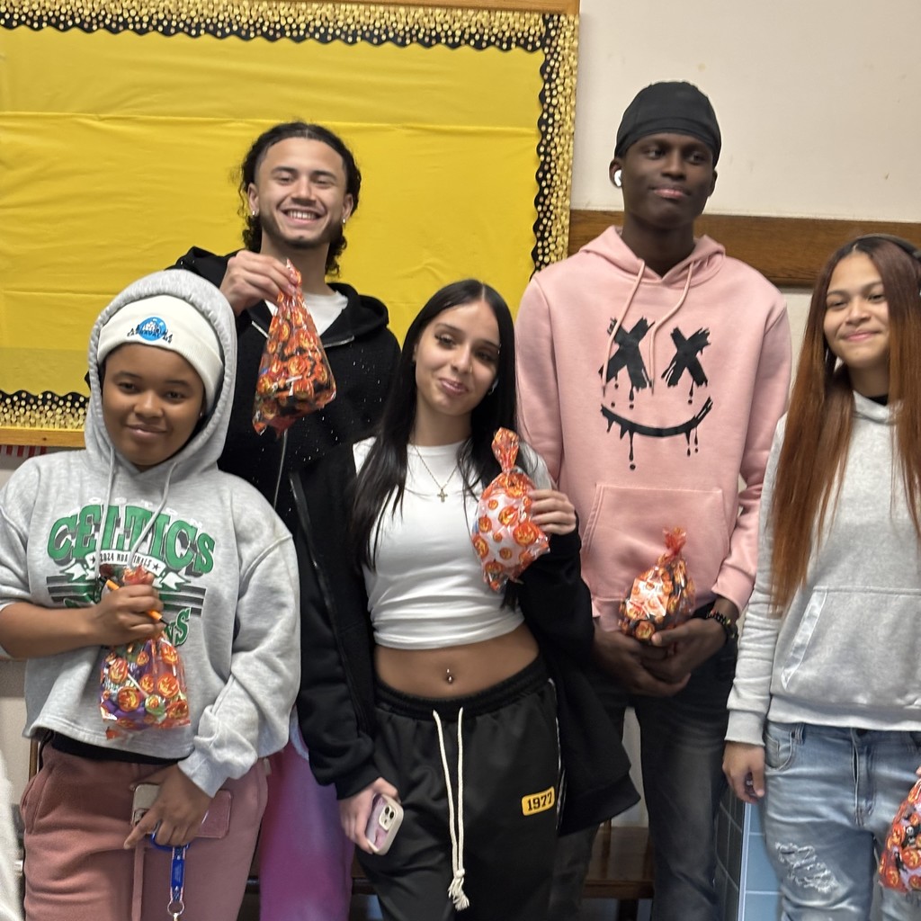 A group of diverse students posing.