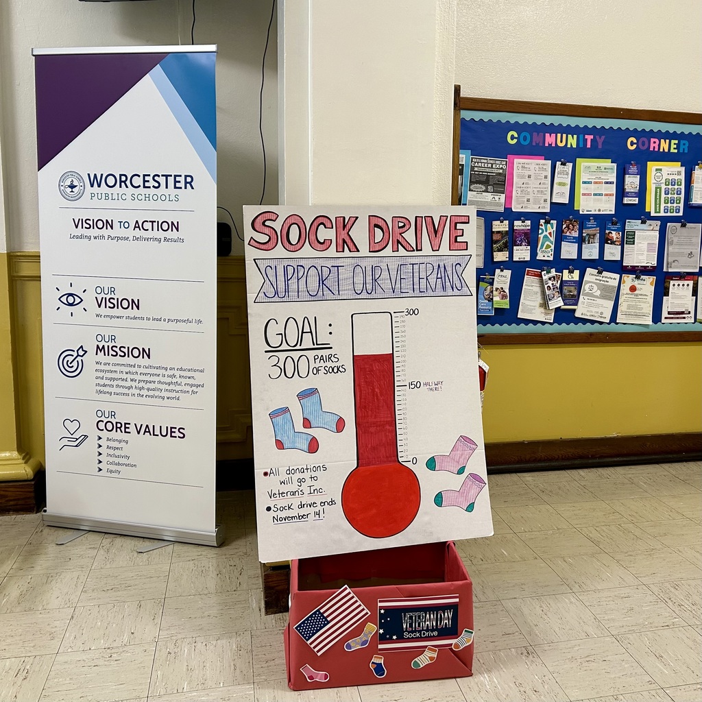 A sign promotes a sock drive to support veterans, with a goal of 300 pairs.