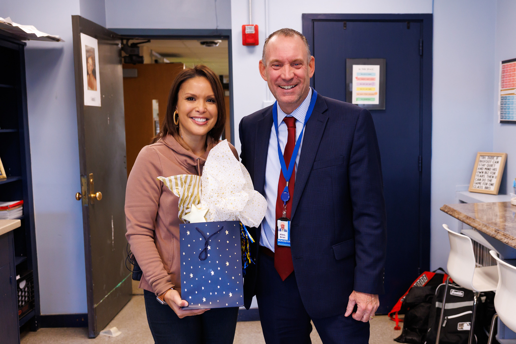Superintendent Allen with Yelitza Agosto.