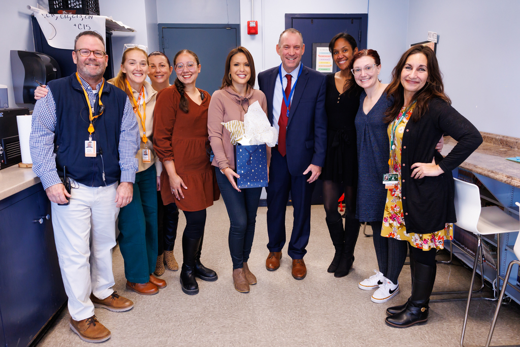 Superintendent Allen with Yelitza Agosto, and staff from Burncoat Middle School.