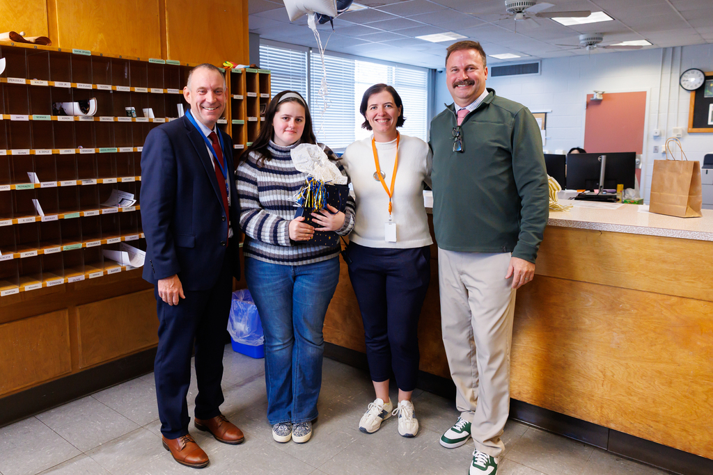 Superintendent Allen with Julianna Cohen, Principal Joseph Ewick and Assistant Principal Michaela Moylan-Faucher.