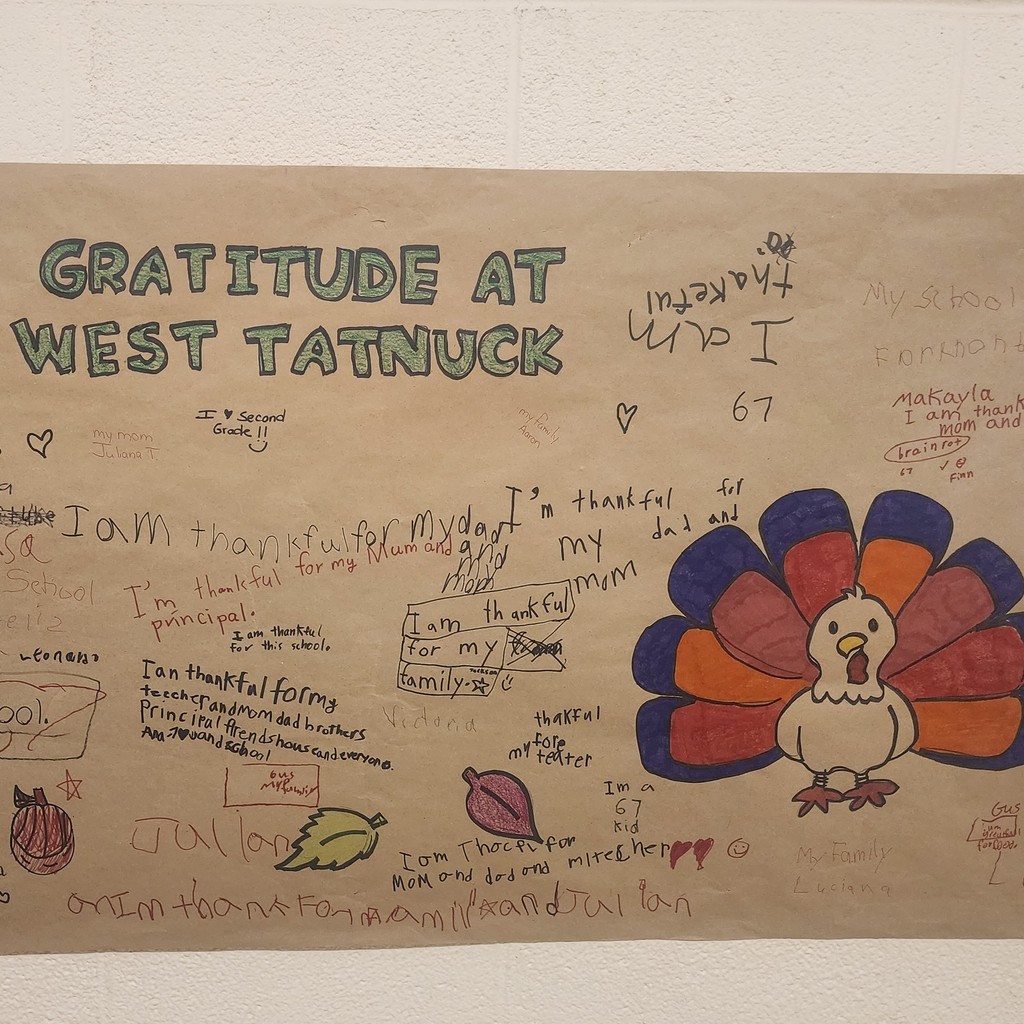 A colorful poster displays messages of gratitude, with a turkey illustration.